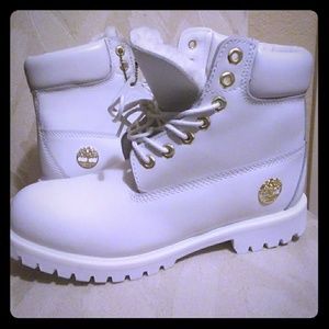 all white timberlands with gold chain laces